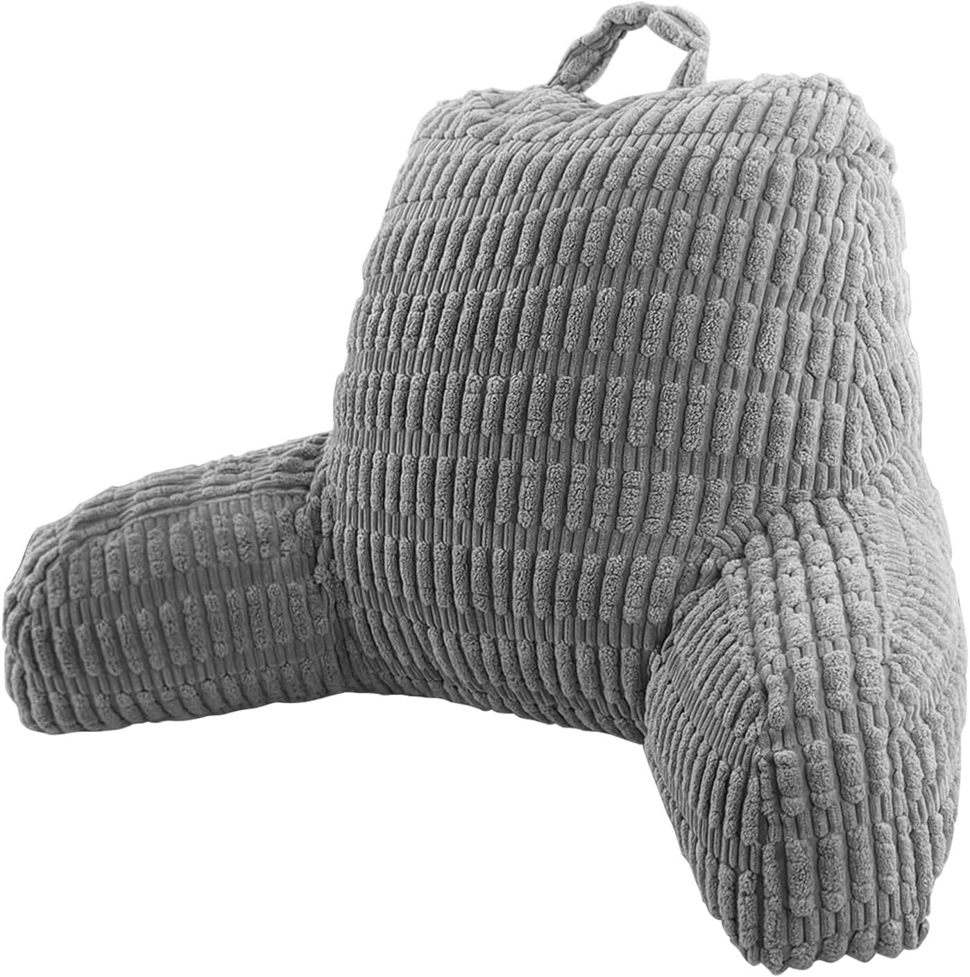 Grey corduroy reading pillow with armrests and a carry handle